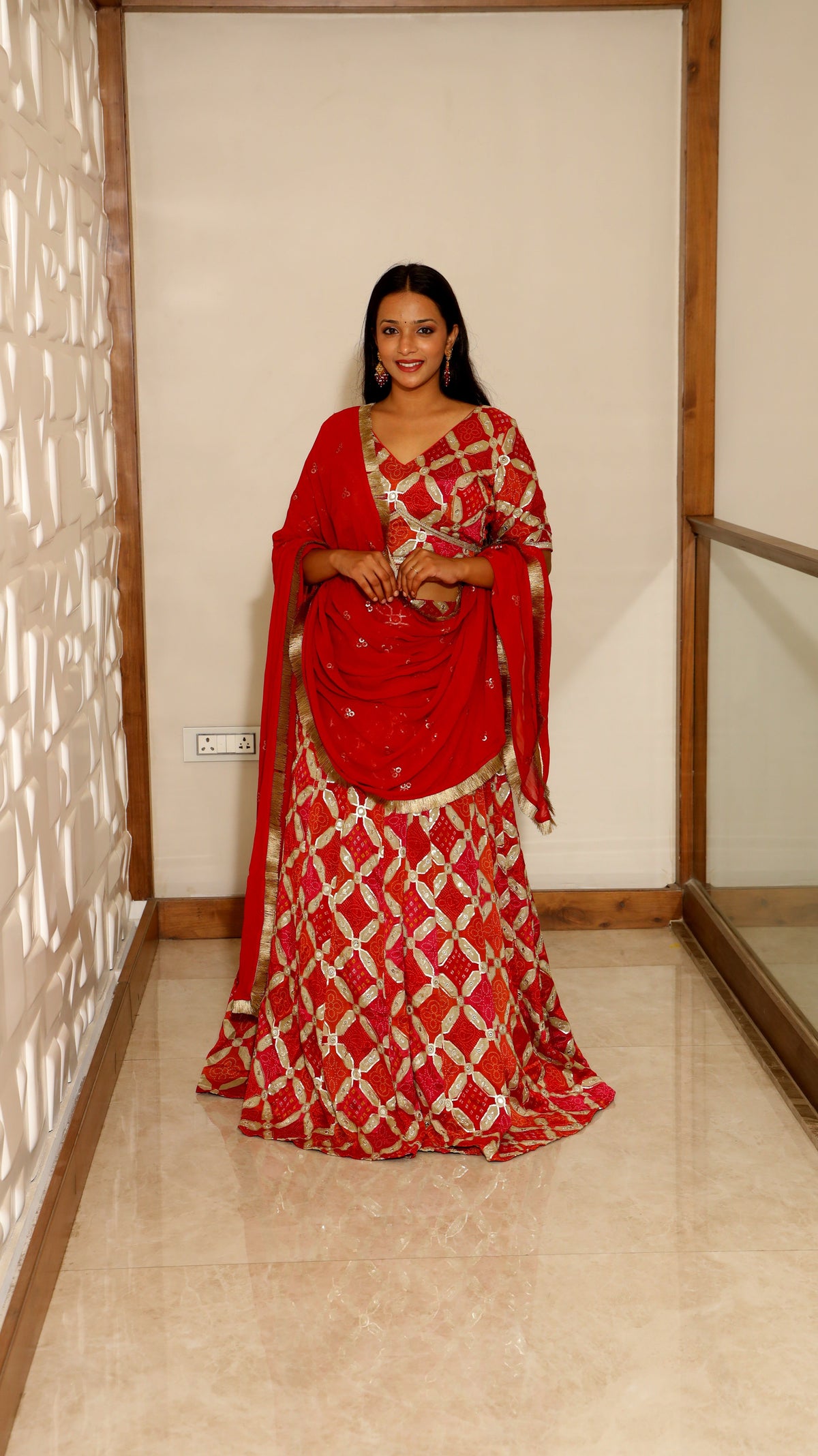 Orange Premium And Elegant Bandhej Lehenga For Women