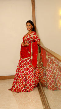 Orange Premium And Elegant Bandhej Lehenga For Women