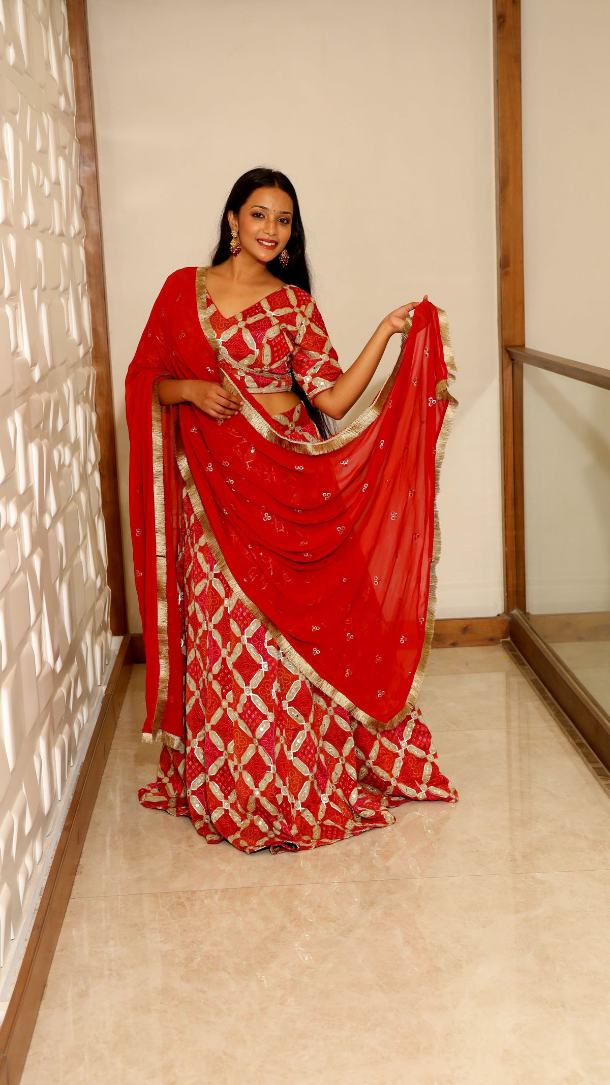 Orange Premium And Elegant Bandhej Lehenga For Women
